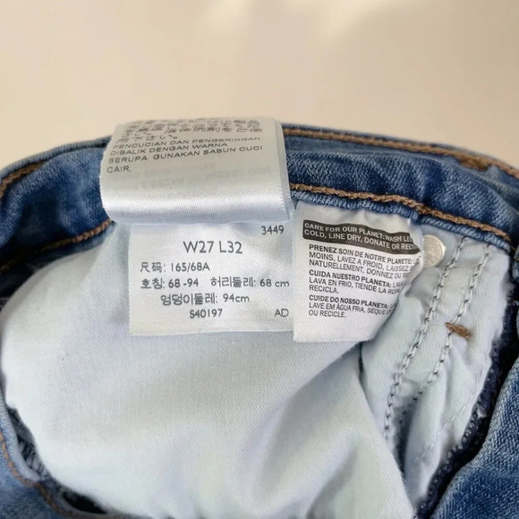 Levi's 311 Shaping Polka Dot Skinny Medium Wash Jeans - Picture 12 of 16